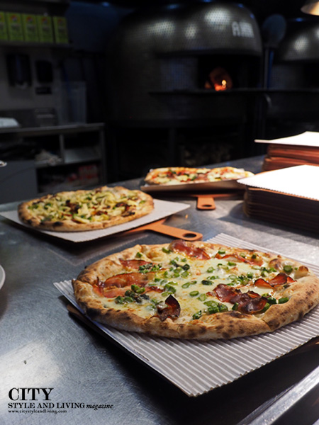 Bigalora Pizza with Oven in Background