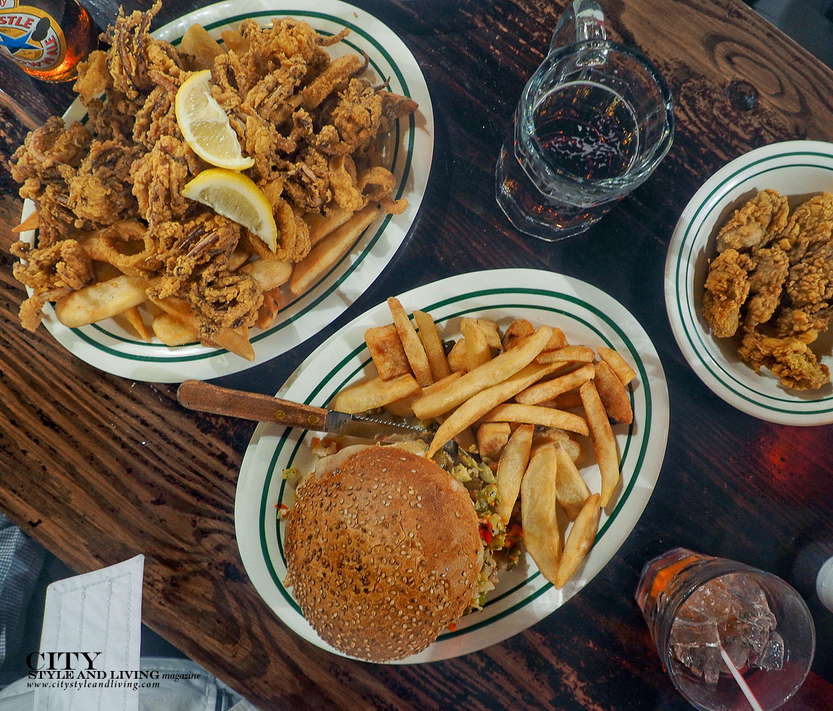 City Style and Living Magazine Cafe Maspero New Orleans dinner fried oysters and muffaletta sandwich