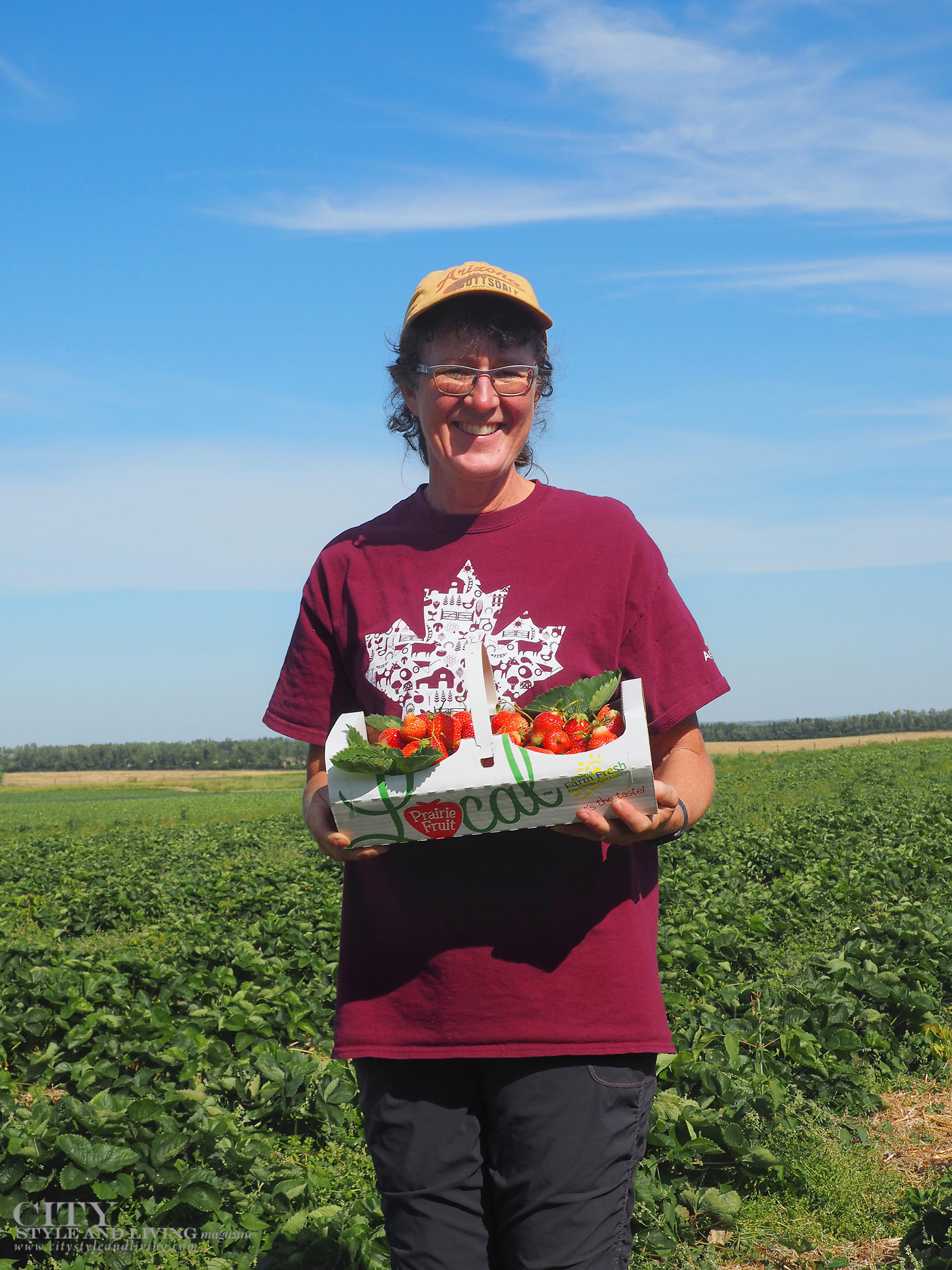 City Style and Living Magazine Travel Foodies Guide Red Deer Alberta leona staples holding strawberries